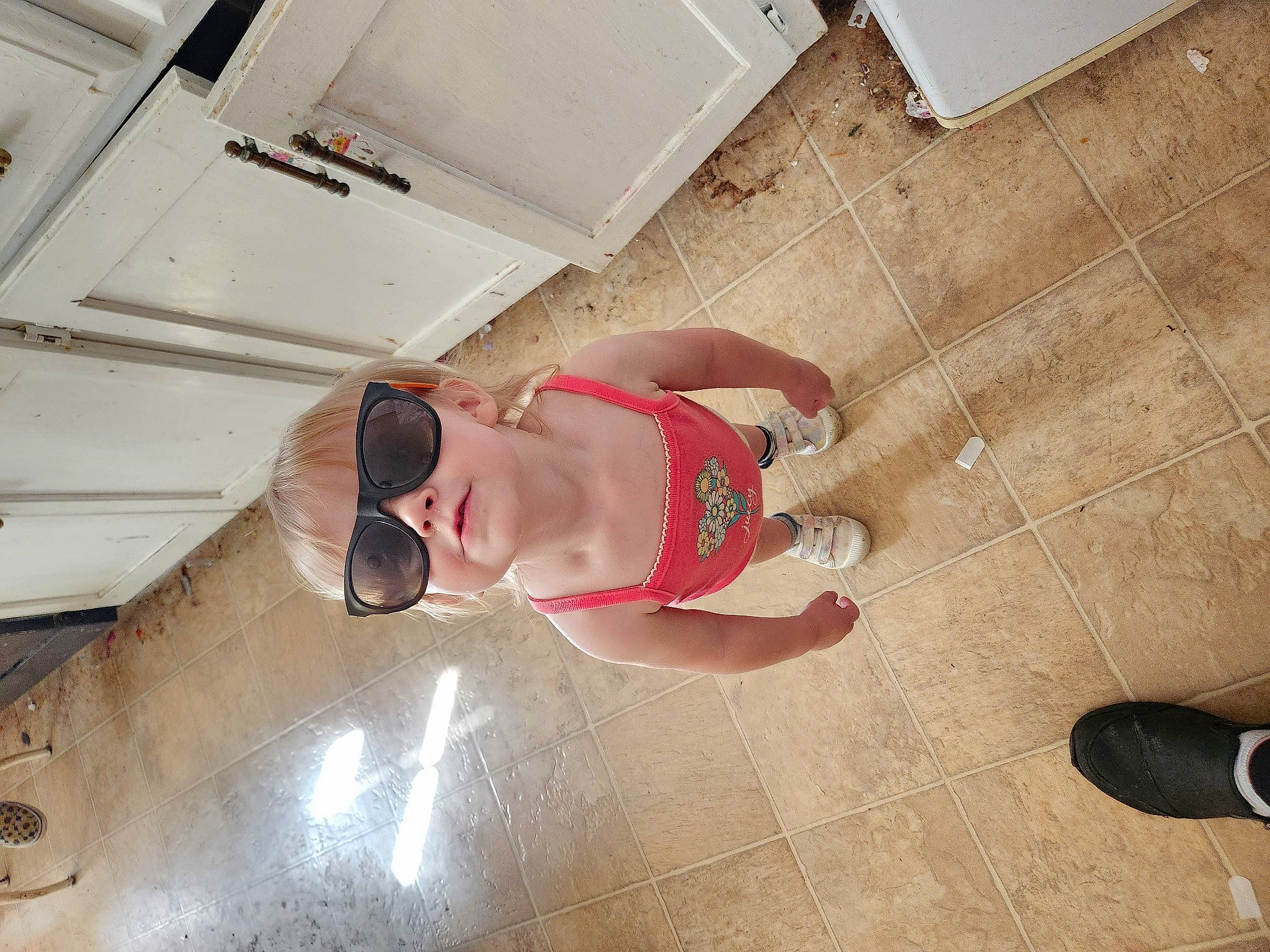 Evalynn joined the competition — help win amazing prizes! abdomen, chest, elbow, eyewear, floor, flooring, foot, fun, goggles, hardwood, human_leg, knee, leisure, person, room, shorts, sunglasses, thigh, toddler, trunk