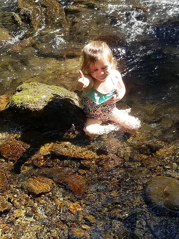 Adelaide is registered to the contest to win money with this photo: child, fun, mud, person, play, rock, soil, toddler, vacation, water