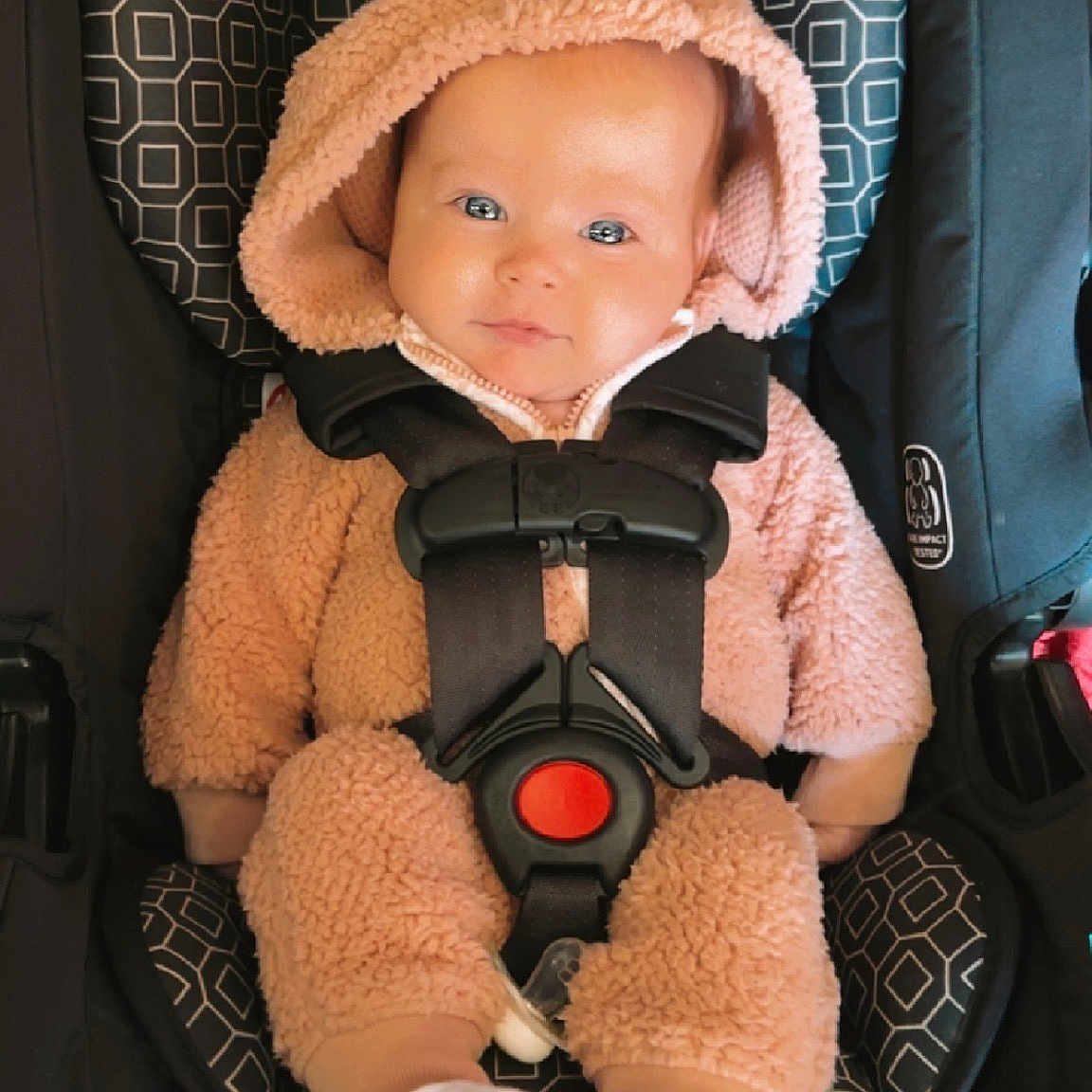 Oaklee is registered to the contest to win money with this photo: baby, baby_carriage, baby_products, baby_safety, baby_toddler_clothing, cap, car_seat, cheek, child, comfort, fashion_accessory, headgear, personal_protective_equipment, product, skin, sleeve, smile, sun_hat, textile, toddler