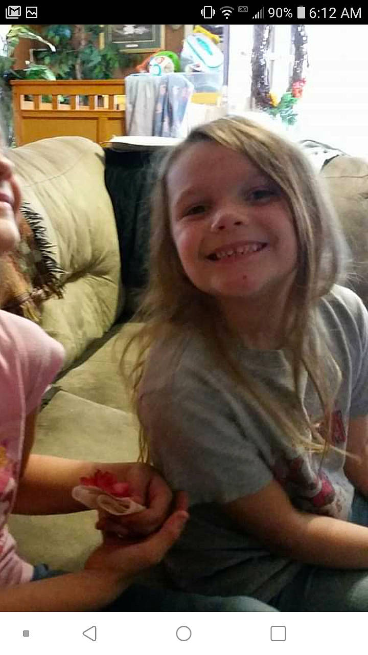 Kinzlee is registered to the contest to win money with this photo: child, ear, facial_expression, fun, joy, laugh, person, sitting, smile, toddler, vacation