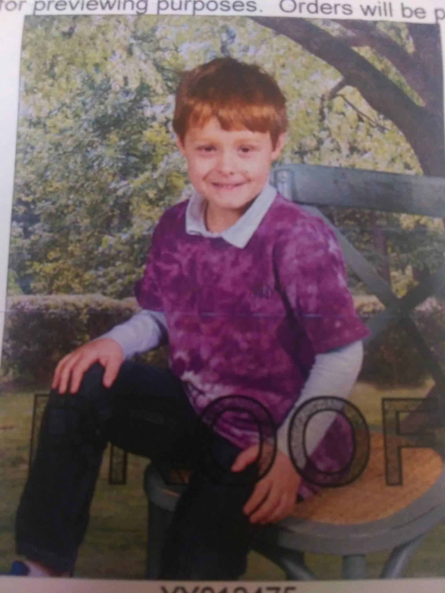 Cayden is registered to the contest to win money with this photo: art, child, joy, pattern, person, photo_caption, portrait, sitting, vintage_clothing