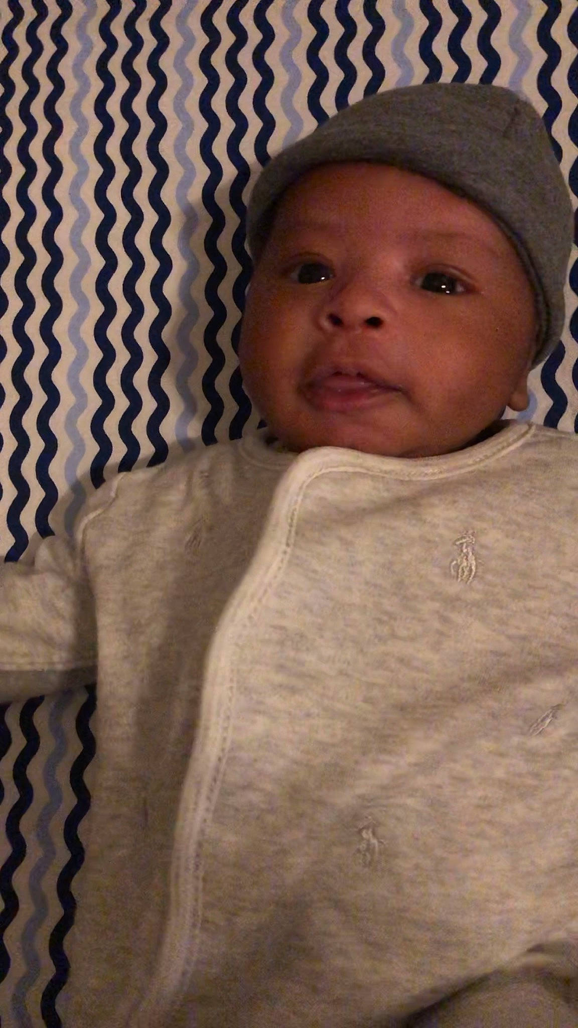 Erik joined the competition — help win amazing prizes! baby, cheek, child, comfort, face, forehead, headwear, linens, nose, outerwear, pattern, person, room, skin, sleeve, smile, textile, toddler, wood, wool