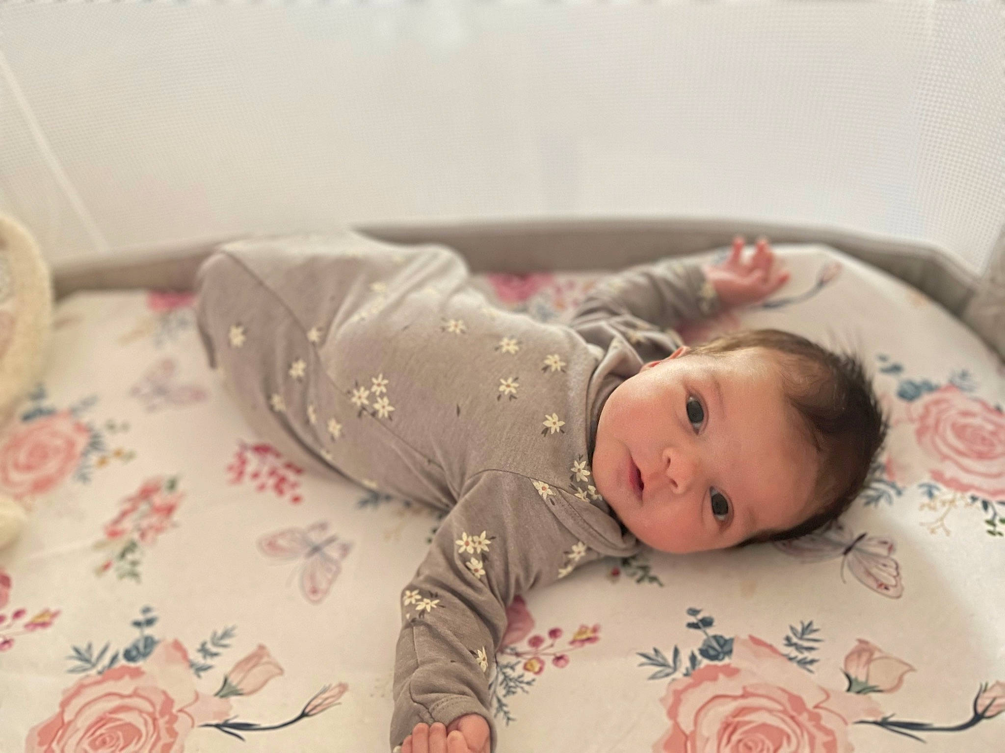 Scarlett joined the competition — help win amazing prizes! baby, baby_toddler_clothing, bed, bedding, child, comfort, eye, flooring, foot, head, linens, pattern, person, pink, room, sitting, skin, sleeve, textile, toddler