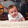 baby, infant, smiling, white_shirt, blanket, vintage_sign, toy_plane, lantern, retro, portrait, cute, child, face, indoors, happy, young, crawling, expression, clothing, background