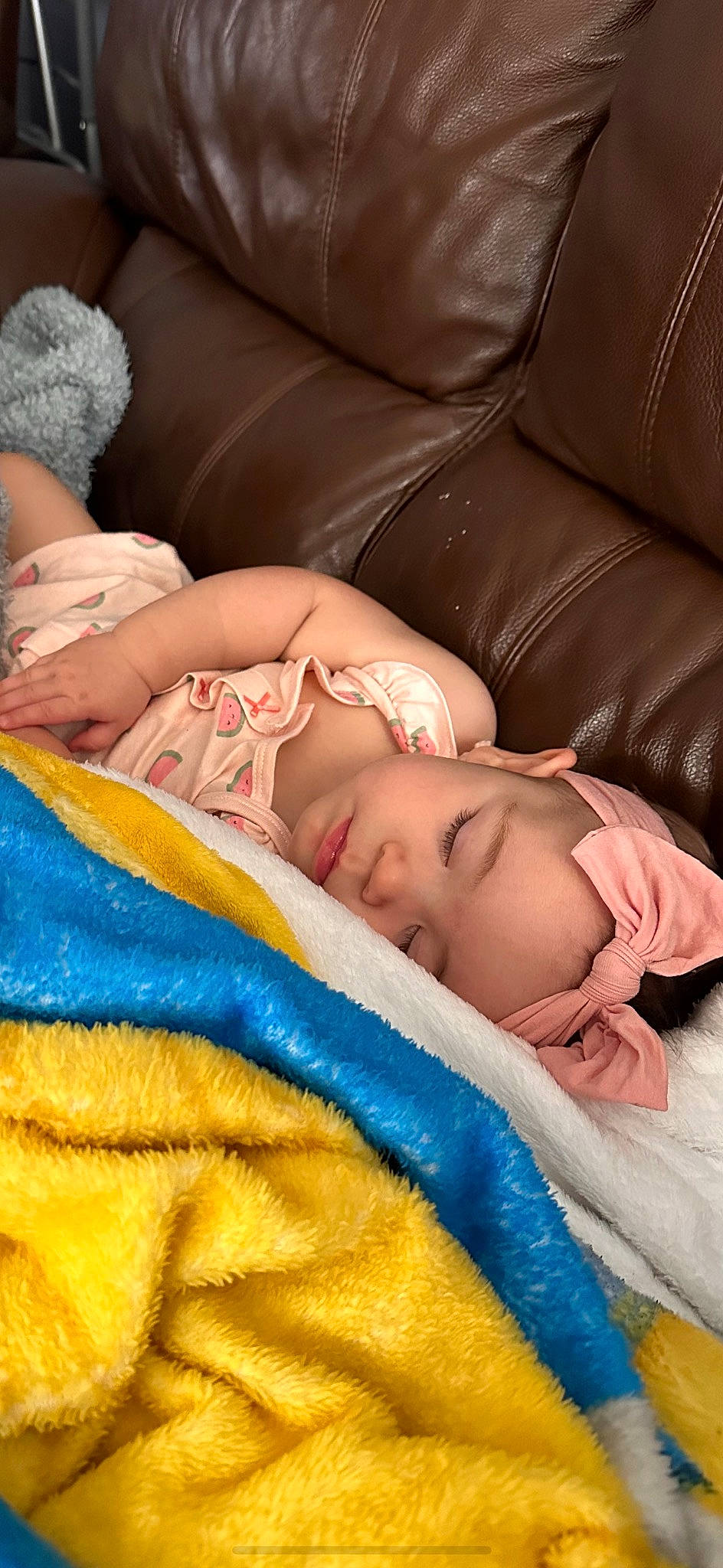 Lorelai is registered to the contest to win money with this photo: baby, cheek, child, comfort, eye, finger, head, headwear, linens, mammal, mouth, muscle, nose, orange, organ, people, person, product, skin, textile