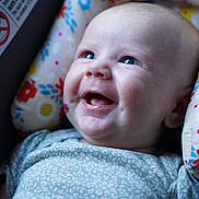 Willow joined the competition — help win amazing prizes! baby, blue_eyes, child, closeup, clothing, comfort, cushion, cute, expression, face, floral_pattern, happy, head, indoors, infant, joy, portrait, seat, skin, smiling