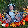 Willow is registered to the contest to win money with this photo: autumn, baby, blanket, child, costume, cute, fall_decor, festive, grass, holiday, infant, nature, outdoor, panda_costume, playful, pumpkins, scarecrows, seasonal, smiling, tongue_out