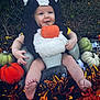 Willow joined the competition — help win amazing prizes! autumn, baby, child, costume, cute, decorations, fence, festive, grass, green, halloween, holiday, infant, orange, outdoor, pumpkin, seat, skunk, smile, white