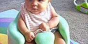 Azalea joined the competition — help win amazing prizes! baby, baby_seat, bear_toy, carpet, child, colorful, curious, cute, floor, headband, indoor, infant, mint_green, pink_flower, plush_toy, rainbow_mat, seated, socks, soft_toys, striped_bib
