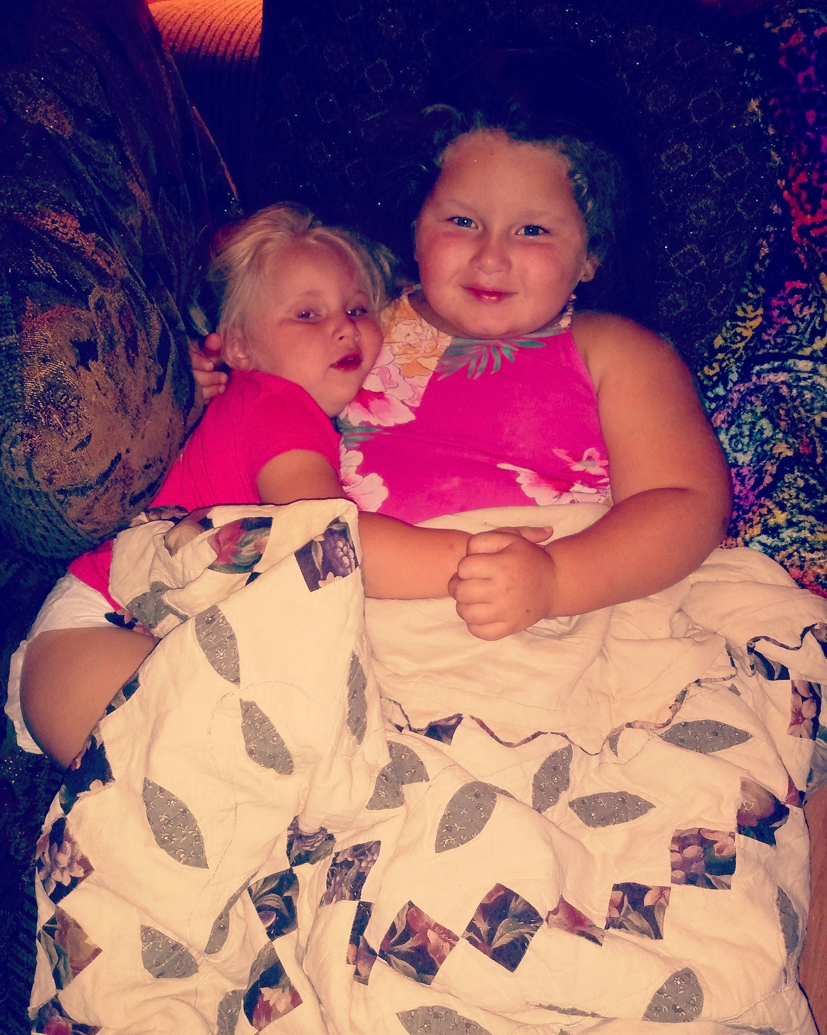 Marleigh is registered to the contest to win money with this photo: baby, cheek, child, eye, face, family, fun, happy, head, human, interaction, iris, joy, lap, mother, people, person, sibling, sitting, skin
