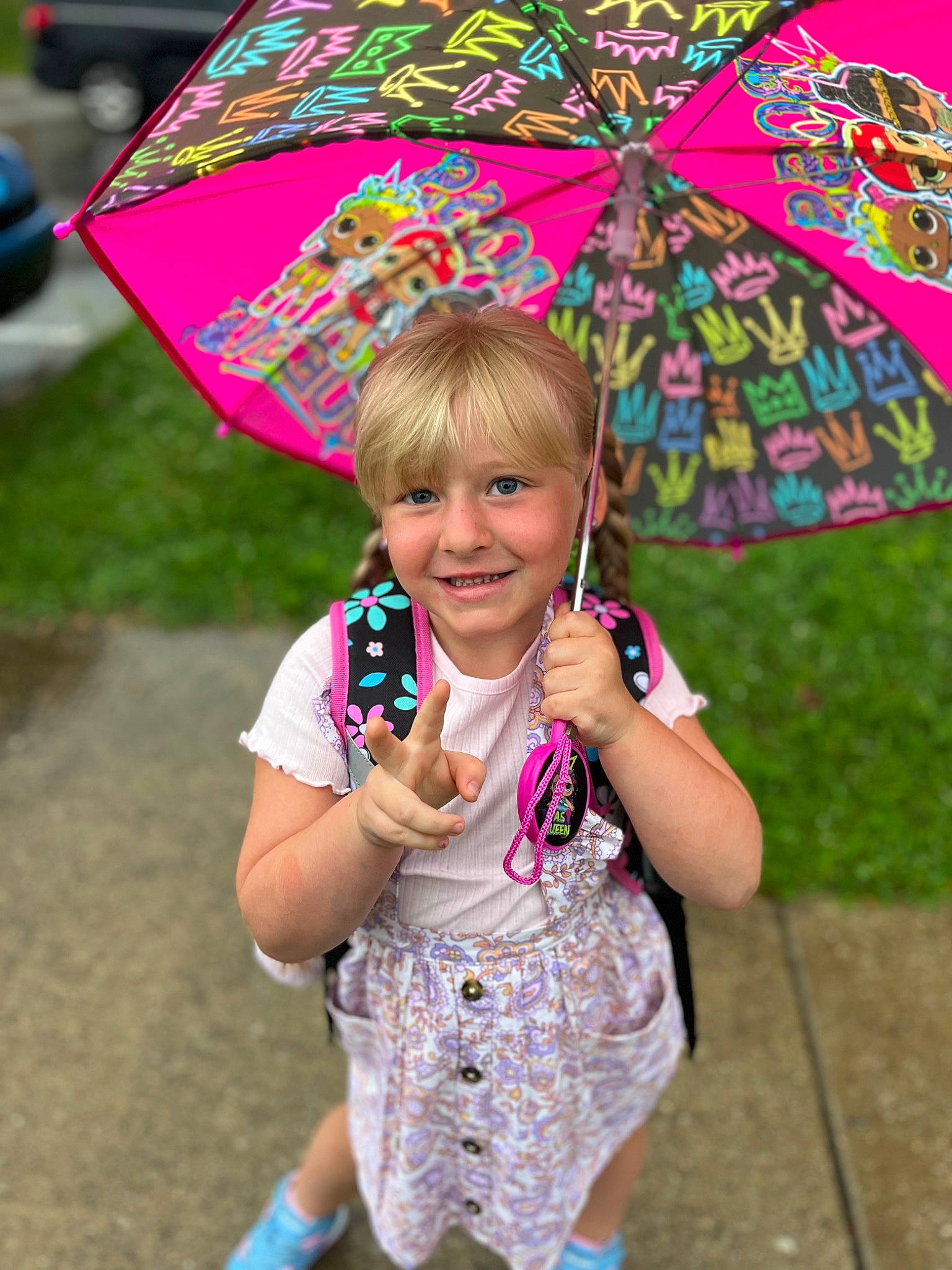 Hadleigh is registered to the contest to win money with this photo: beauty, botany, fun, grass, happy, joy, leaf, leisure, nature, people, person, photograph, pink, plant, recreation, smile, snapshot, summer, tints_and_shades, umbrella