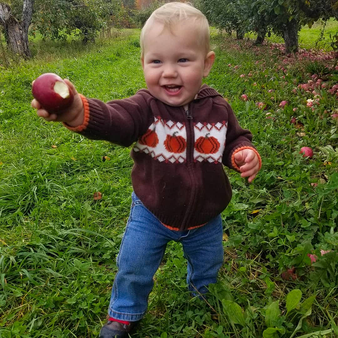 Granger joined the competition — help win amazing prizes! baby_toddler_clothing, ball, botany, clothing, flower, gesture, grass, grass_family, groundcover, happy, joy, lawn, leaf, people_in_nature, person, plant, pumpkin, smile, summer, toddler