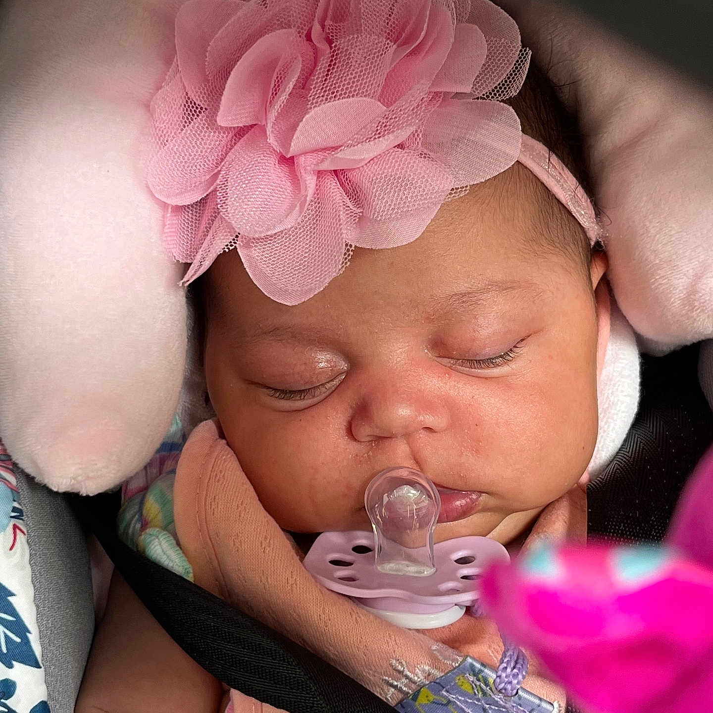 Na Mora joined the competition — help win amazing prizes! adorable, baby, baby_clothing, car_seat, child, closeup, cushion, cute, face, flower, headband, infant, newborn, pacifier, peaceful, pink, resting, seatbelt, sleeping, soft