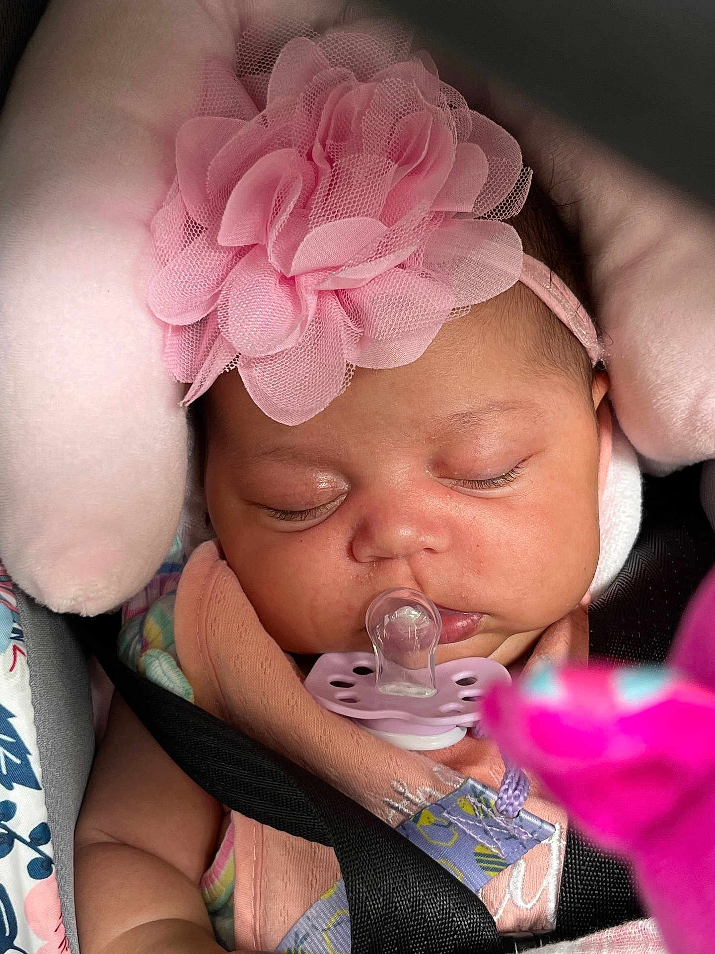 Na Mora joined the competition — help win amazing prizes! baby, infant, sleeping, pacifier, headband, flower, car_seat, seatbelt, pink, soft, cushion, child, closeup, peaceful, cute, adorable, baby_clothing, resting, newborn, face