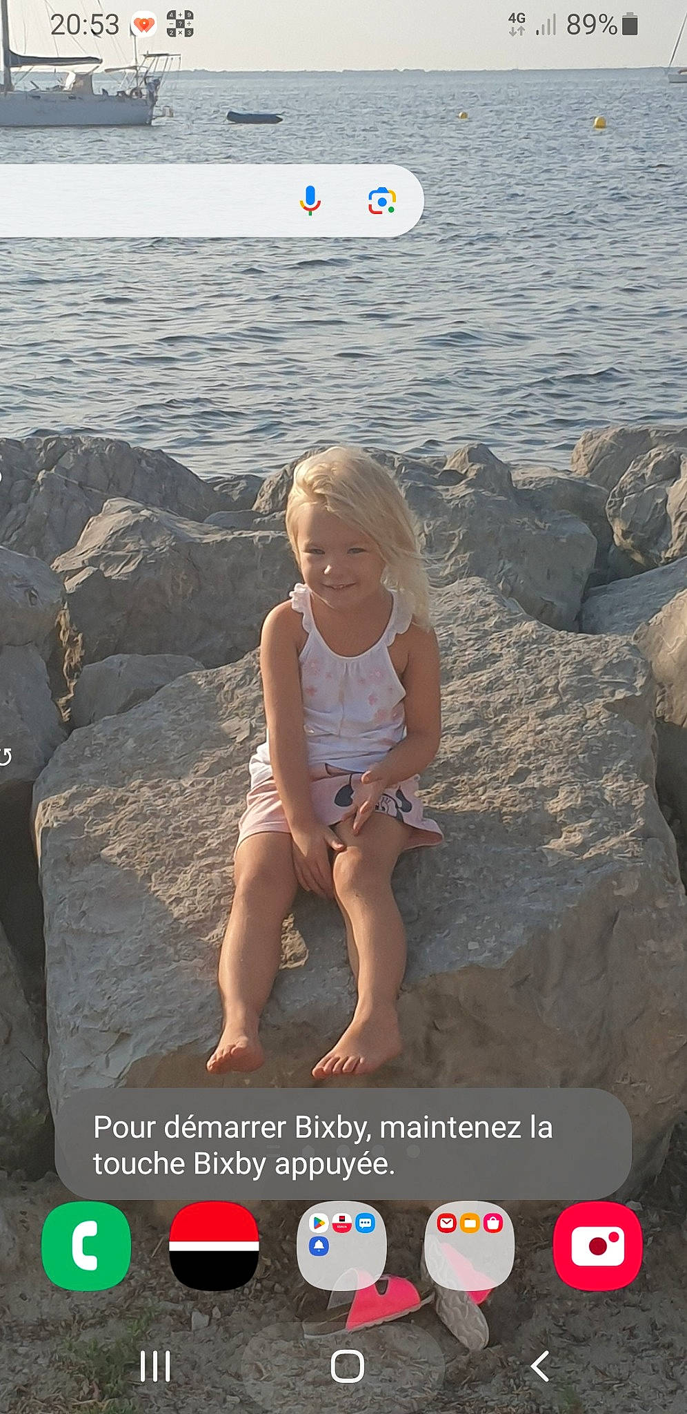 Myla a rejoint le concours — aidez-le/la à gagner de superbes lots ! beach, beauty, body_of_water, flash_photography, fun, happy, human, joy, leisure, light, natural_environment, people, person, photograph, sand, shore, shorts, smile, thigh, toddler