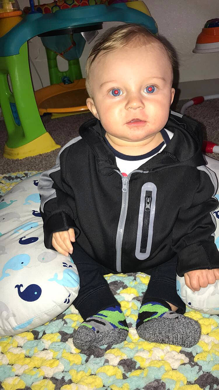 Waylon James joined the competition — help win amazing prizes! baby, baby_toddler_clothing, black, chair, cheek, child, eye, face, fun, green, head, jacket, pattern, person, sitting, sleeve, snapshot, t_shirt, toddler, white