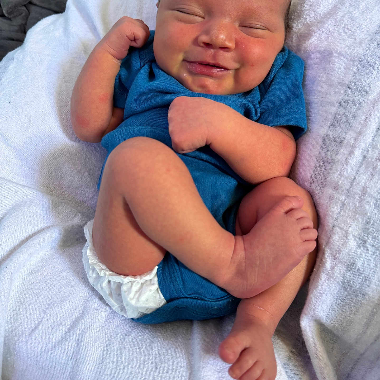 Xzavion joined the competition — help win amazing prizes! baby, blanket, blue_onesie, child, cozy, cute, diaper, gray_blanket, human, indoors, infant, newborn, peaceful, portrait, resting, sleeping, small_feet, small_hands, smiling, white_blanket