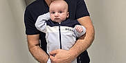 Mathèo a rejoint le concours — aidez-le/la à gagner de superbes lots ! accessories, baby, clothing, coat, face, footwear, glasses, head, jacket, jewelry, pants, people, person, photography, portrait, ring, shirt, shoe, shorts, t_shirt