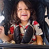 Art Iv is registered to the contest to win money with this photo: baby, casual, child, clothing, curly_hair, cute, happy, indoors, joyful, person, playful, portrait, seat, seatbelt, sitting, smile, spiderman_shirt, stroller, toddler, young_child