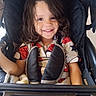 Art Iv is registered to the contest to win money with this photo: baby, bright, casual, child, childhood, clothing, curly_hair, cute, face, happy, indoor, joy, kid, person, portrait, seated, smile, spiderman_shirt, stroller, young