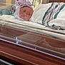 Saria joined the competition — help win amazing prizes! newborn, baby, hospital, bassinet, blanket, bow, hat, infant, sleeping, medical_equipment, room, window, reflection, wood, furniture, person, face, wrapped, peaceful, indoor
