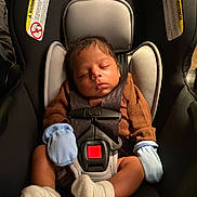 Kassiah joined the competition — help win amazing prizes! baby, black_car_seat, britax, brown_clothing, car_seat, child, child_safety, closeup, cute, indoors, infant, mittens, newborn, peaceful, portrait, resting, safety, seatbelt, sleeping, socks
