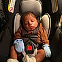 baby, black_car_seat, britax, brown_clothing, car_seat, child, child_safety, closeup, cute, indoors, infant, mittens, newborn, peaceful, portrait, resting, safety, seatbelt, sleeping, socks