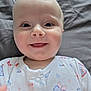 Charlotte joined the competition — help win amazing prizes! baby, infant, smiling, face, tongue, onesie, butterfly_pattern, cozy, blanket, lying_down, cute, child, happy, close_up, skin, head, eyes, mouth, expression, soft