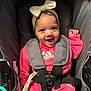 baby, child, smiling, pink_clothing, headband, bow, stroller, seatbelt, adidas, happy, infant, cute, portrait, sitting, eyes, face, clothing, baby_girl, indoor, baby_accessory