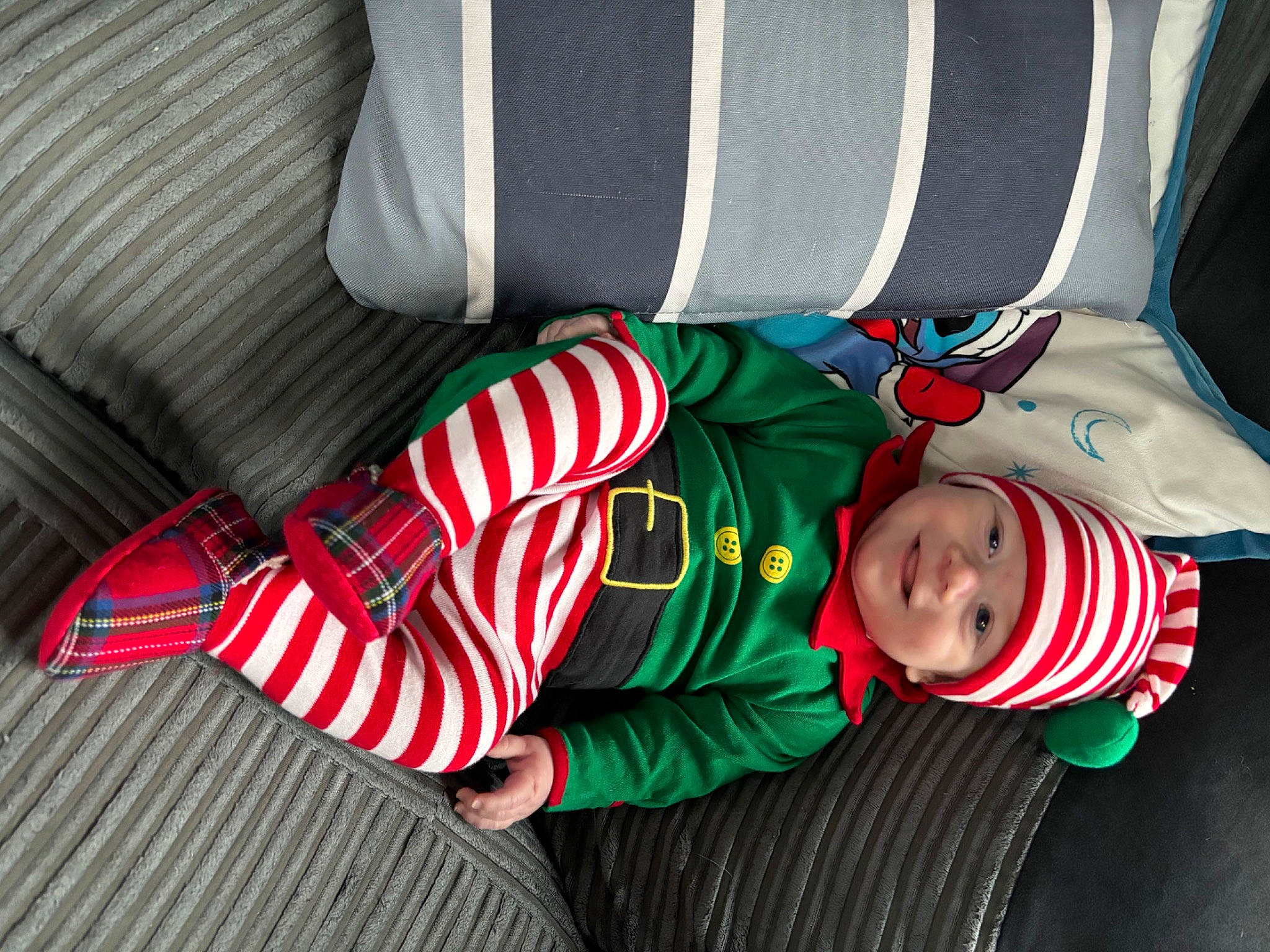 Teddy joined the competition — help win amazing prizes! baby_toddler_clothing, carmine, child, christmas, christmas_elf, christmas_eve, comfort, costume_hat, event, fictional_character, hat, headwear, holiday, joy, lap, pattern, person, sitting, sleeve, sock