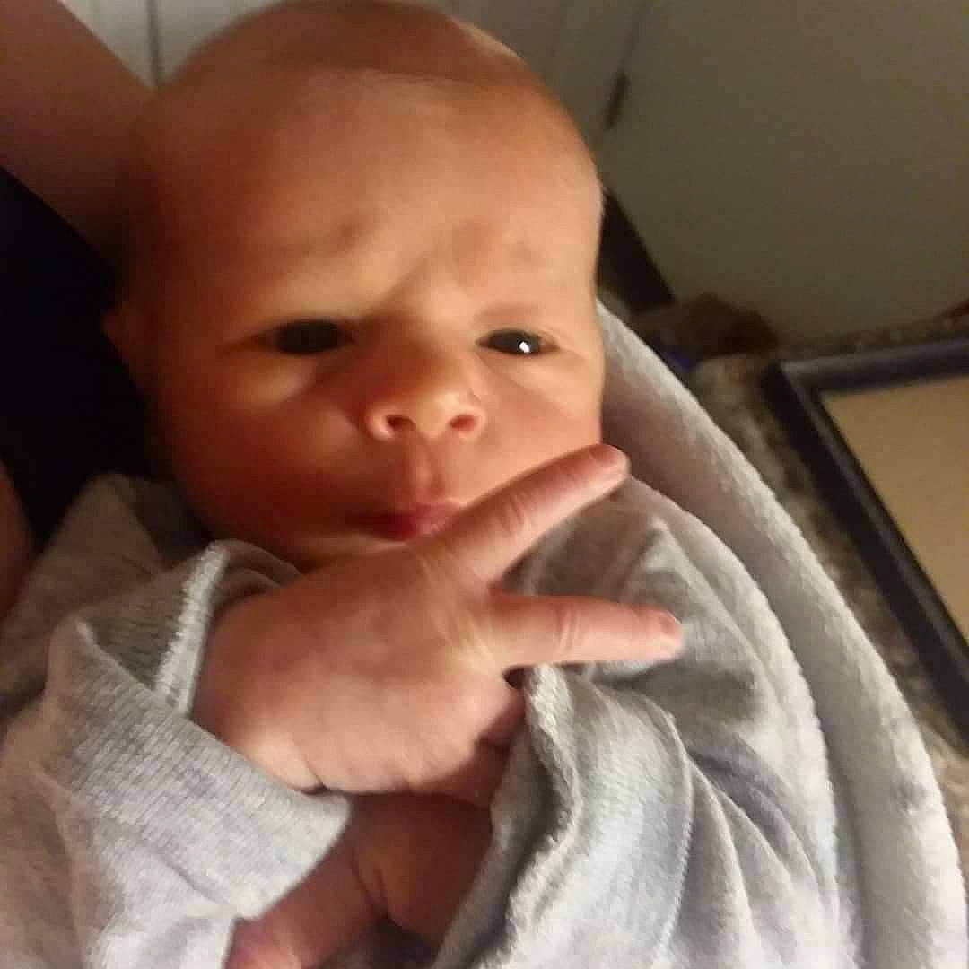 Brennen is registered to the contest to win money with this photo: cheek, child, chin, ear, eyebrow, face, finger, forehead, hand, head, infant, joy, lip, mouth, nose, person, product, thumb, toddler