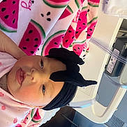 Chanel is registered to the contest to win money with this photo: architecture, baby, baseballcap, bonnet, building, cap, clothing, device, doll, electricaldevice, face, happy, hat, head, hospital, person, photography, portrait, smile, toy