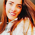 Kathelyne K.