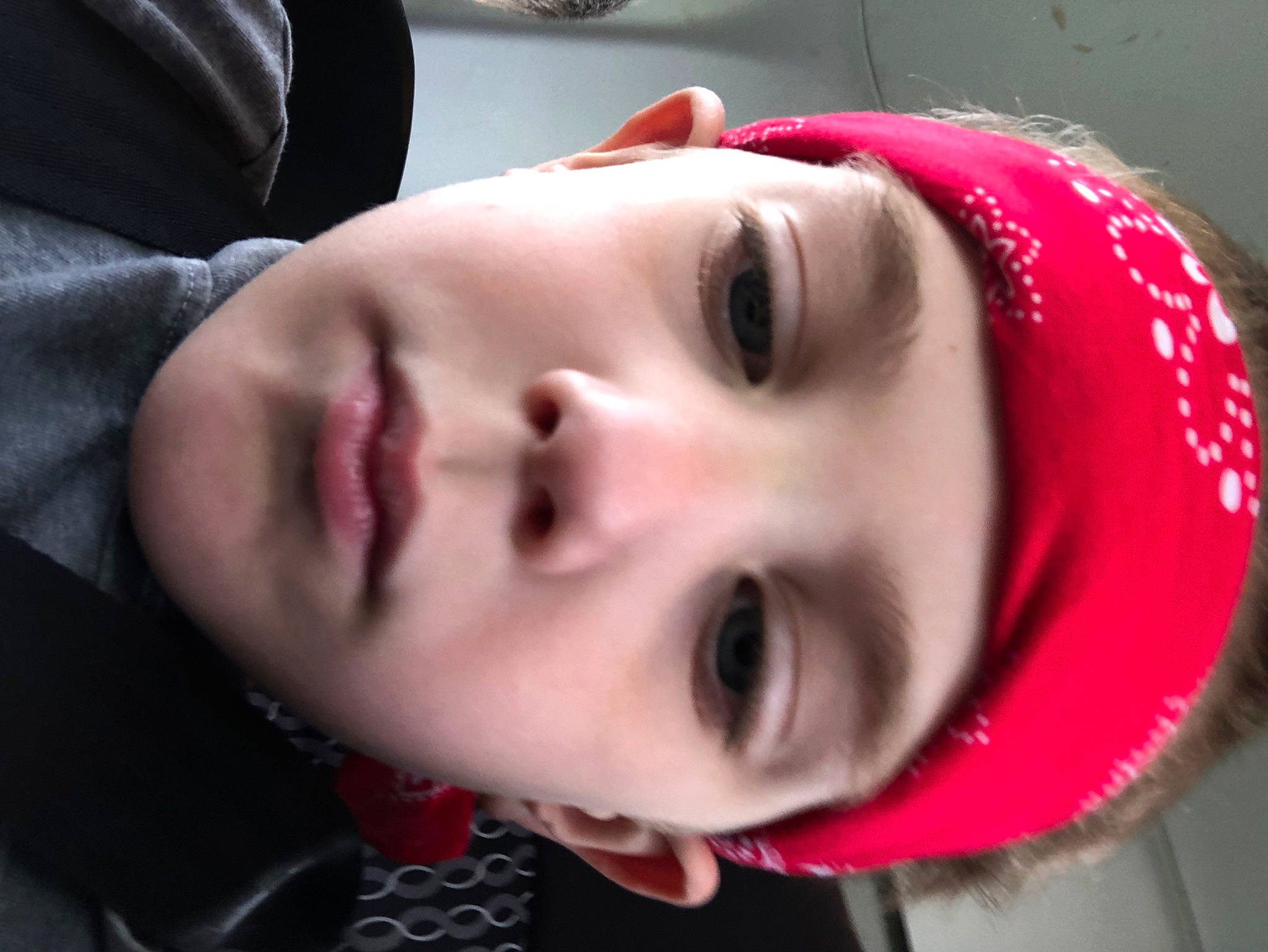 Konnor is registered to the contest to win money with this photo: cheek, child, chin, cool, ear, eye, eyebrow, face, facial_expression, forehead, head, headgear, headwear, lip, mouth, neck, nose, person, pink, red