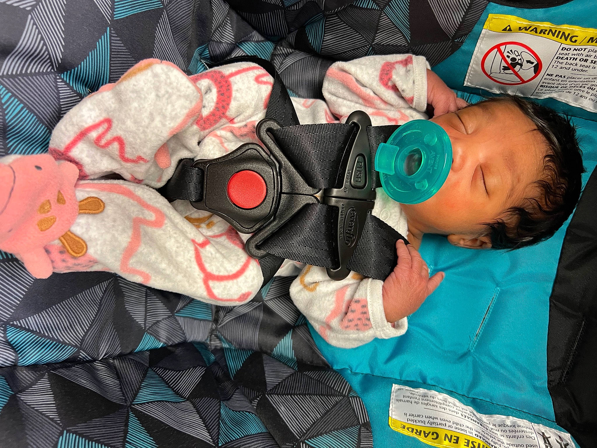 Brooklyn is registered to the contest to win money with this photo: baby, baby_products, baby_toddler_clothing, bag, bedtime, carmine, child, comfort, green, hat, linens, luggage_and_bags, mammal, nap, pattern, person, room, sleeve, t_shirt, textile