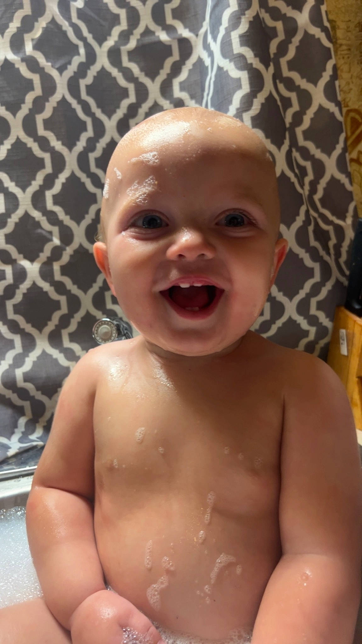 Kamden is registered to the contest to win money with this photo: baby, bathing, cheek, eye, eyebrow, eyelash, face, forehead, hair, happy, human_body, iris, jaw, lip, mouth, neck, nose, person, skin, smile