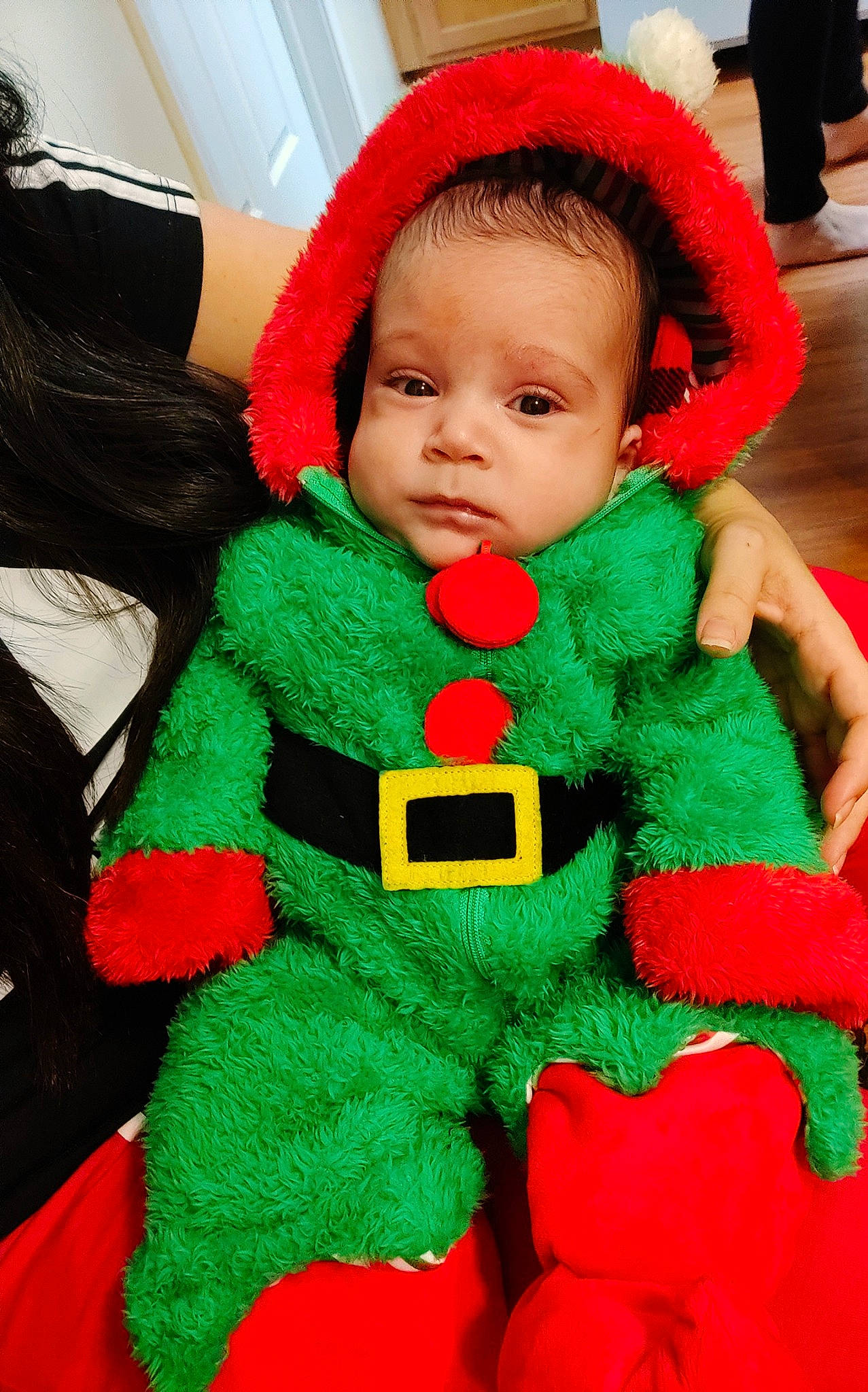 Ivar joined the competition — help win amazing prizes! baby, baby_toddler_clothing, carmine, child, christmas, christmas_decoration, christmas_eve, christmas_ornament, costume_hat, event, facial_expression, fictional_character, green, holiday, organ, person, red, santa_claus, sleeve, textile