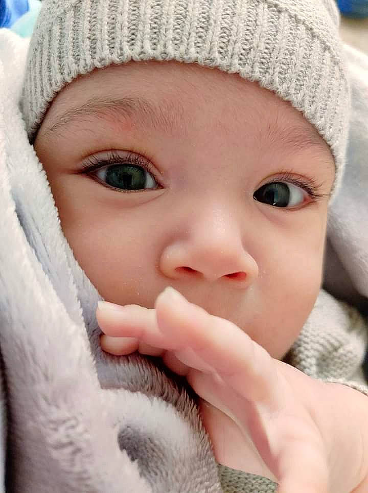 Ivar is registered to the contest to win money with this photo: blue, cap, cheek, chin, eye, eyebrow, eyelash, face, head, headwear, human, iris, lip, mouth, nose, organ, outerwear, person, photograph, skin