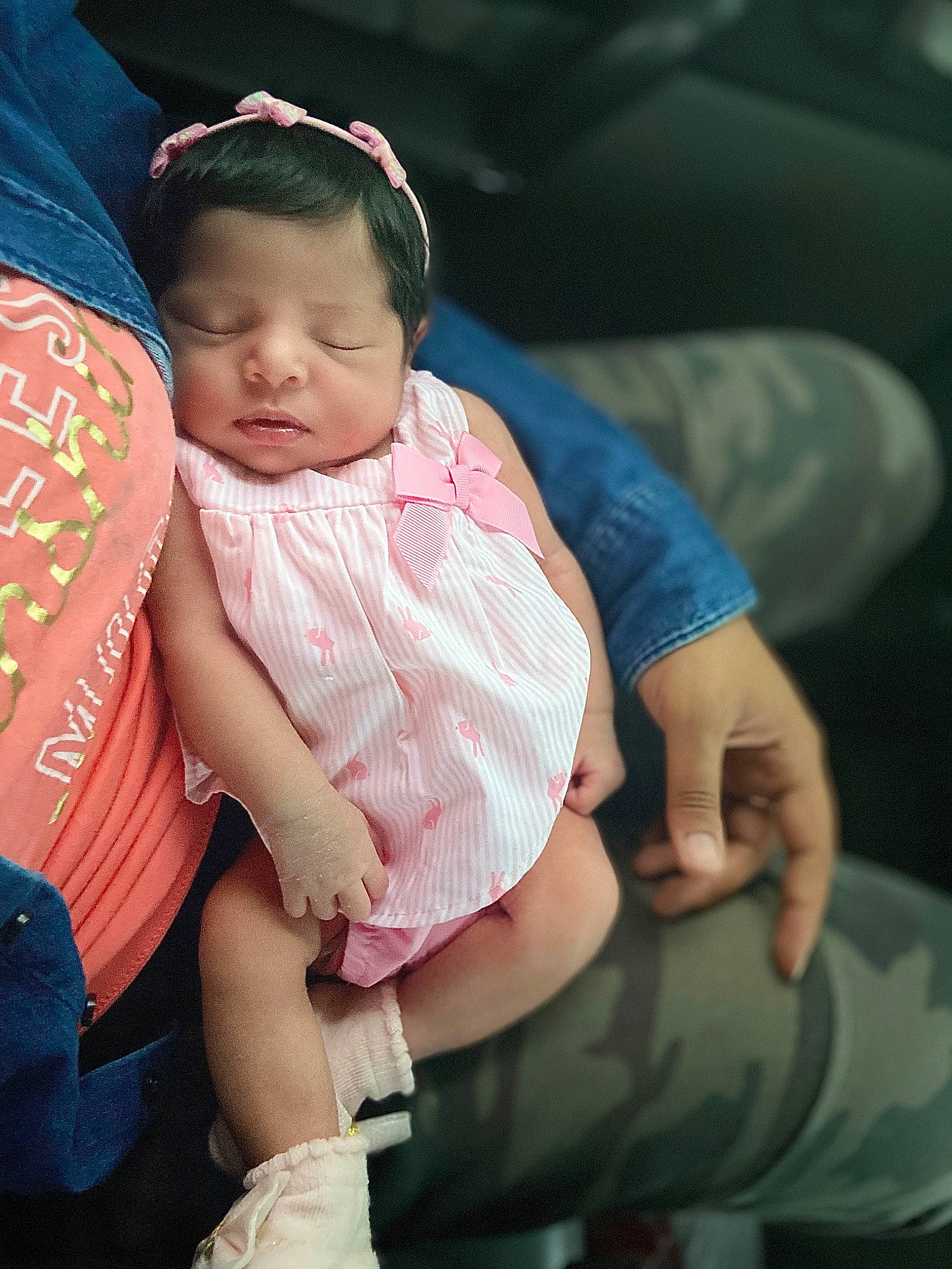 Pamela is registered to the contest to win money with this photo: abdomen, arm, baby, birth, car_seat, cheek, child, family, finger, hand, happy, human, leg, people, person, pink, sitting, skin, toddler, trunk