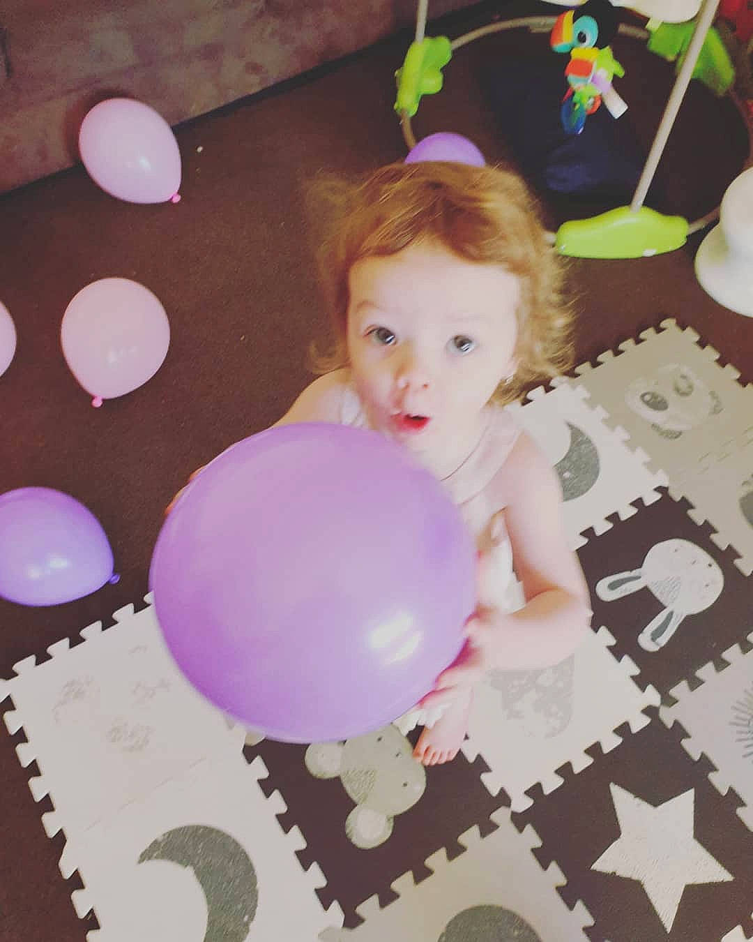 Emerald joined the competition — help win amazing prizes! baby, balloon, birthday, child, party, person, pink, play, room, smile, toddler