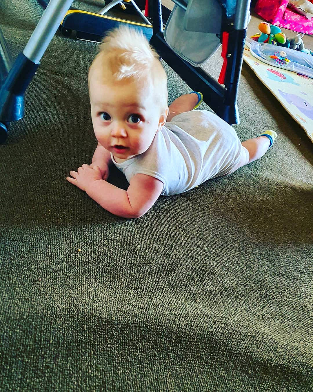 Noah is registered to the contest to win money with this photo: baby, carpet, child, crawling, floor, flooring, person, play, toddler