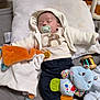 Maélan participe au concours pour gagner de l'argent avec cette photo : baby, sleeping, pacifier, plush_toy, blanket, clothing, infant, bed, pillow, toy, footwear, cute, sleepwear, child, comfort, soft, indoors, peaceful, rest, young