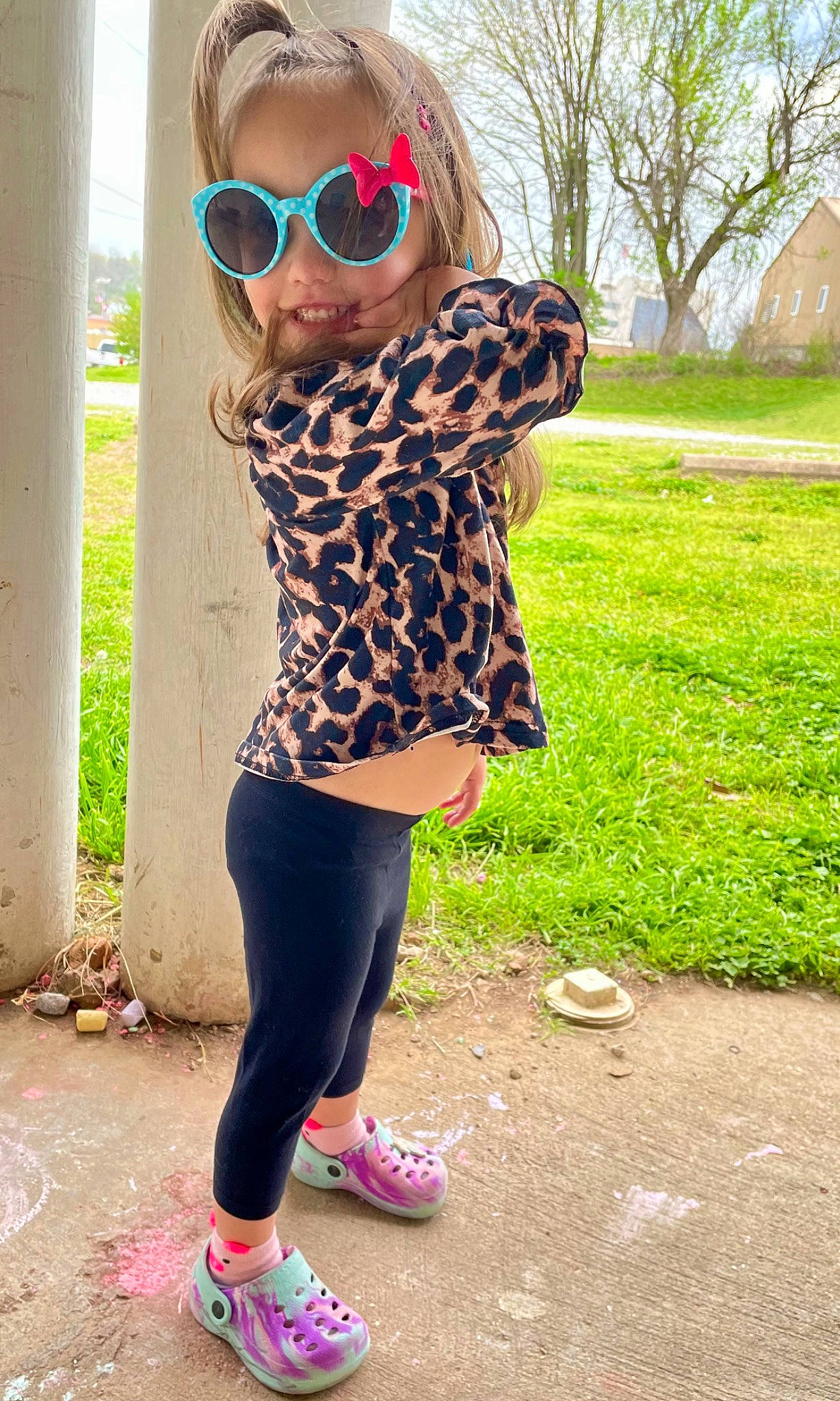 Hazelee is registered to the contest to win money with this photo: active_pants, eyewear, glasses, goggles, grass, happy, knee, leg, magenta, outerwear, person, pink, shoe, sleeve, sportswear, sunglasses, t_shirt, thigh, vision_care, waist