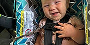 Maelle is registered to the contest to win money with this photo: baby, bodypart, bonnet, car, car_interior, clothing, face, finger, hand, handcuffs, hat, head, person, photography, portrait, skin, sunhat, tattoo, transportation, vehicle