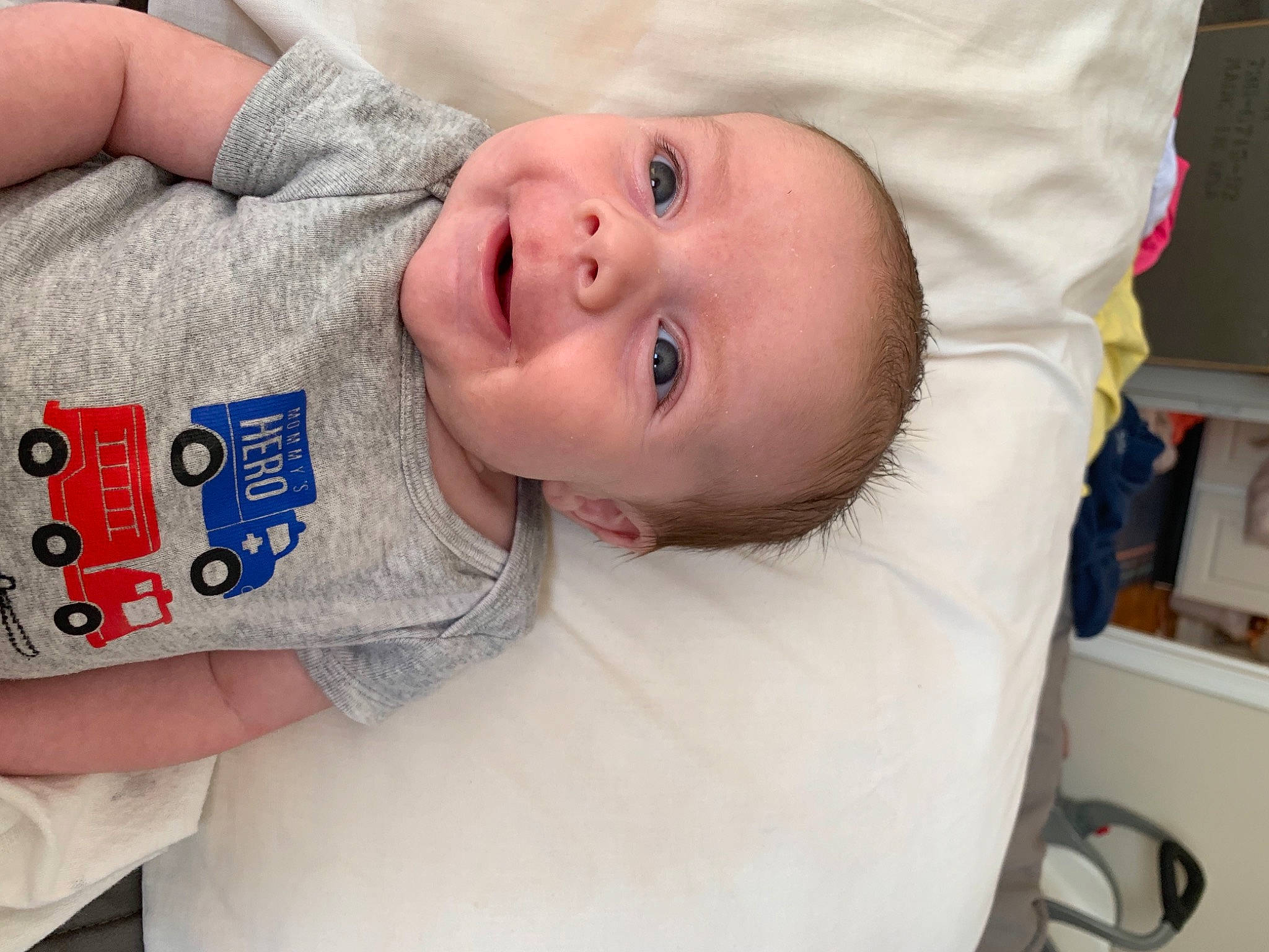 Jaxson is registered to the contest to win money with this photo: baby, baby_products, baby_safety, baby_toddler_clothing, cheek, child, comfort, eye, face, facial_expression, happy, head, human_body, lip, mouth, nose, person, skin, sleeve, smile