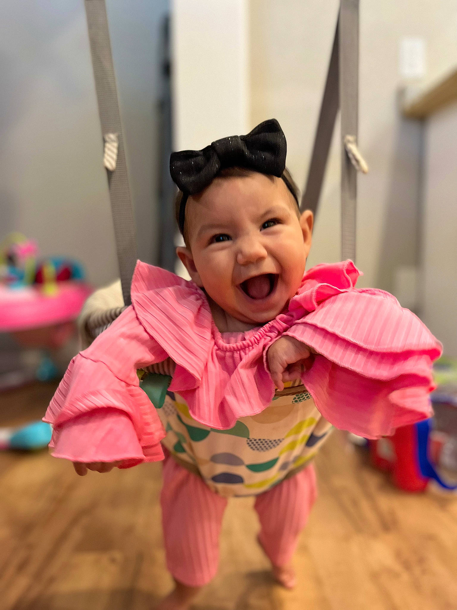 Heavenly is registered to the contest to win money with this photo: baby, baby_toddler_clothing, child, costume, entertainment, event, eye, flooring, fun, grass, happy, hardwood, headwear, leisure, magenta, performing_arts, person, pink, recreation, smile