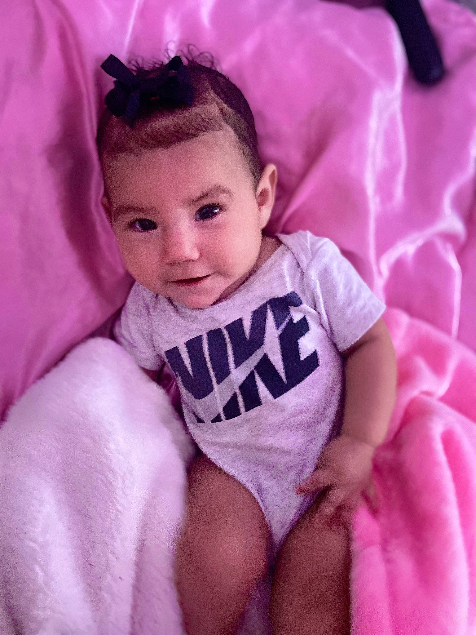 Heavenly is registered to the contest to win money with this photo: baby, baby_toddler_clothing, cheek, chin, cool, eye, eyebrow, eyelash, face, happy, iris, neck, person, pink, purple, skin, sleeve, textile, thigh, toddler