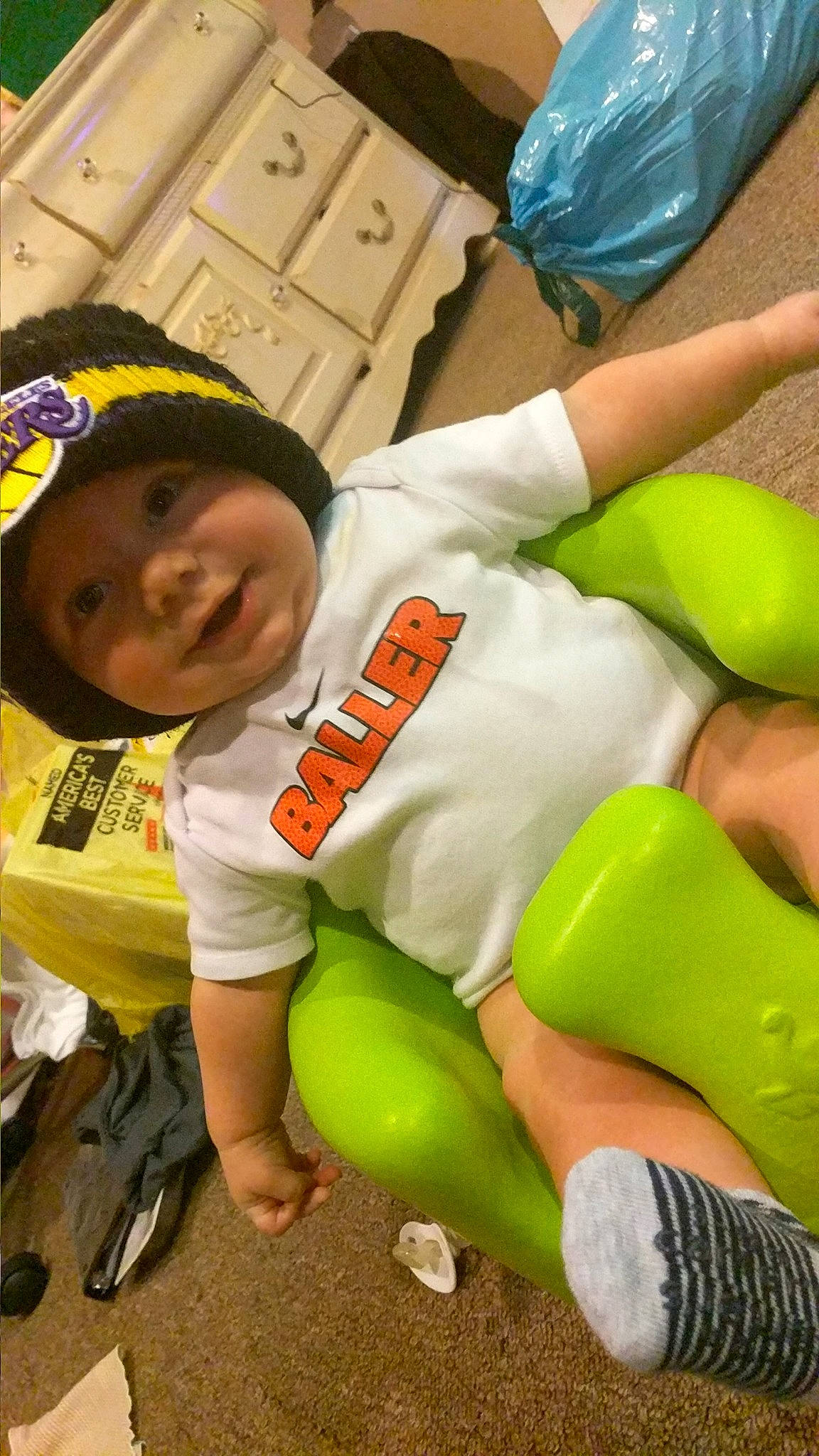 Bryson is registered to the contest to win money with this photo: child, headwear, joy, leg, person, toddler