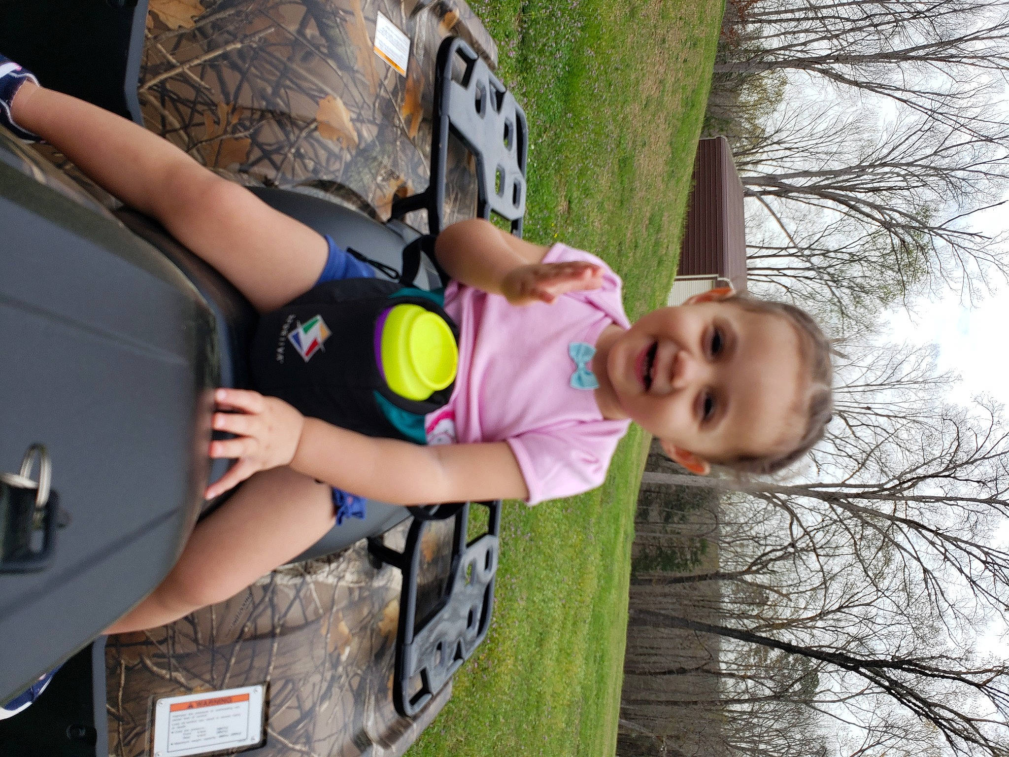 Amyra joined the competition — help win amazing prizes! auto_part, automotive_exterior, car, child, family_car, fun, grass, happy, joy, leisure, motor_vehicle, person, plant, recreation, shorts, sky, smile, t_shirt, toddler, tree