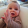 Charly a rejoint le concours — aidez-le/la à gagner de superbes lots ! baby, bokeh, clapping, close_up, clothing, cute, expression, eyes, face, hair, hands, happy, indoor, infant, mouth, pillow, portrait, skin, smile, sofa